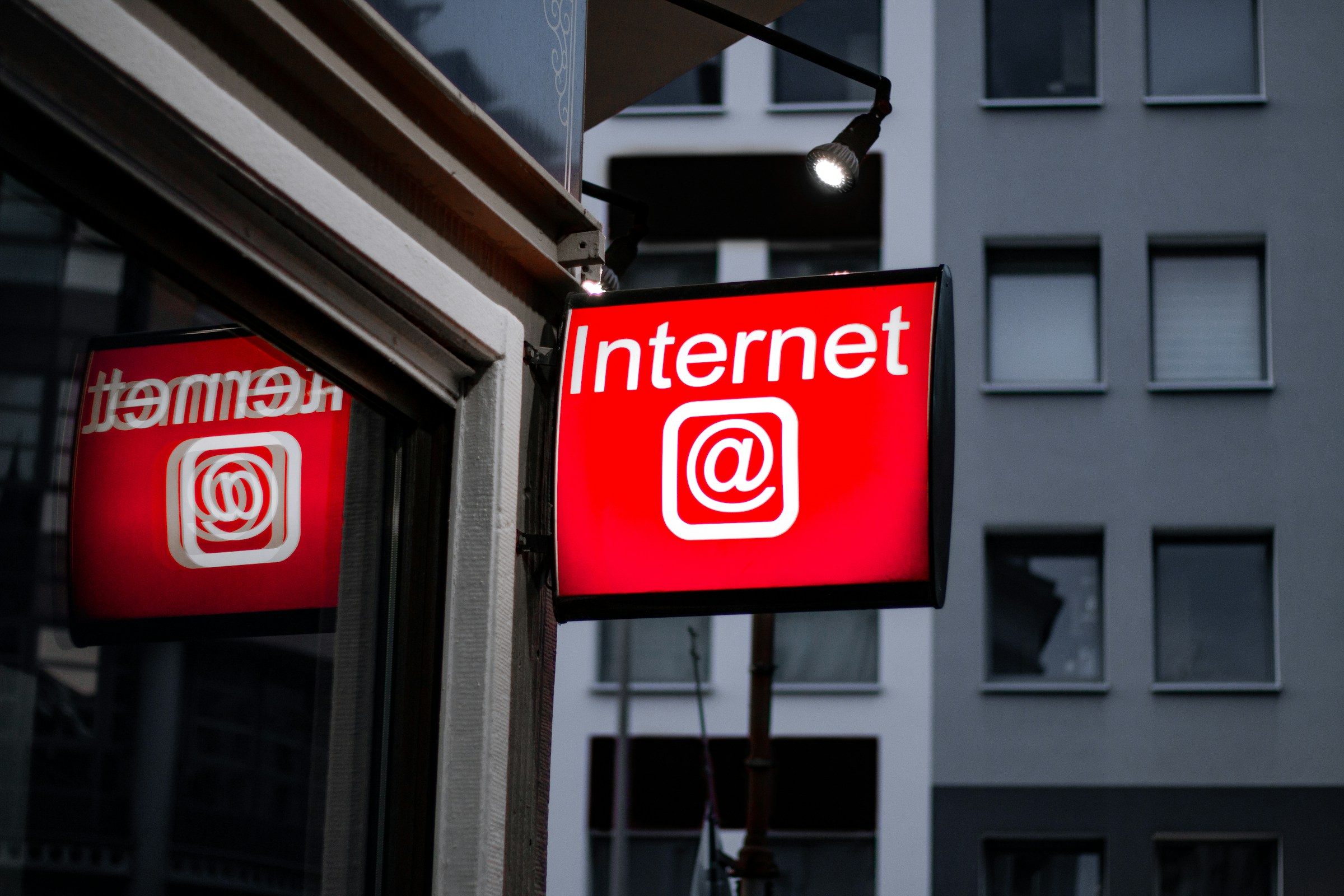 Internet led sign beside building near buildings